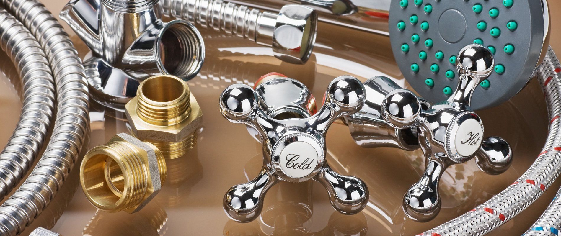 Plumbing fixture replacement work on a kitchen sink and faucet